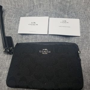 Black Coach Signature Wristlet wallet